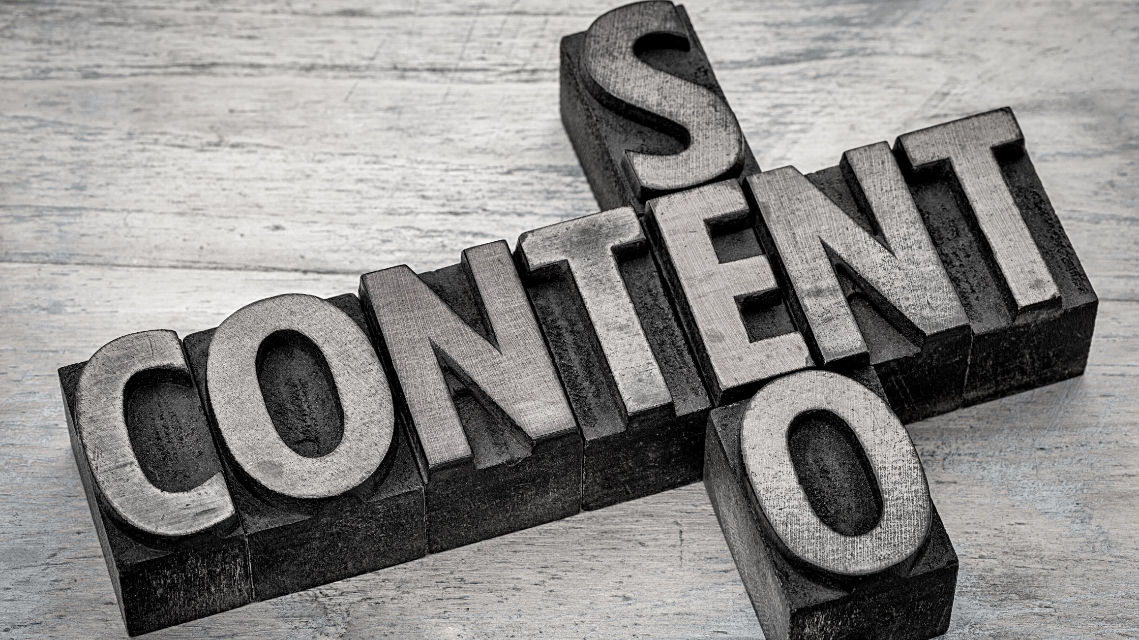 wooden block words that say content and seo intersect