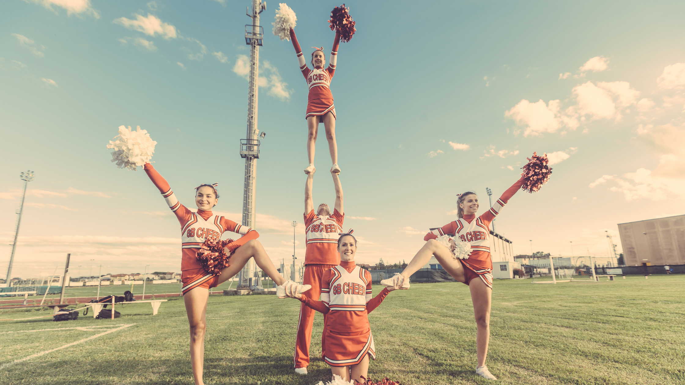 cheerleaders in a pyramid formation