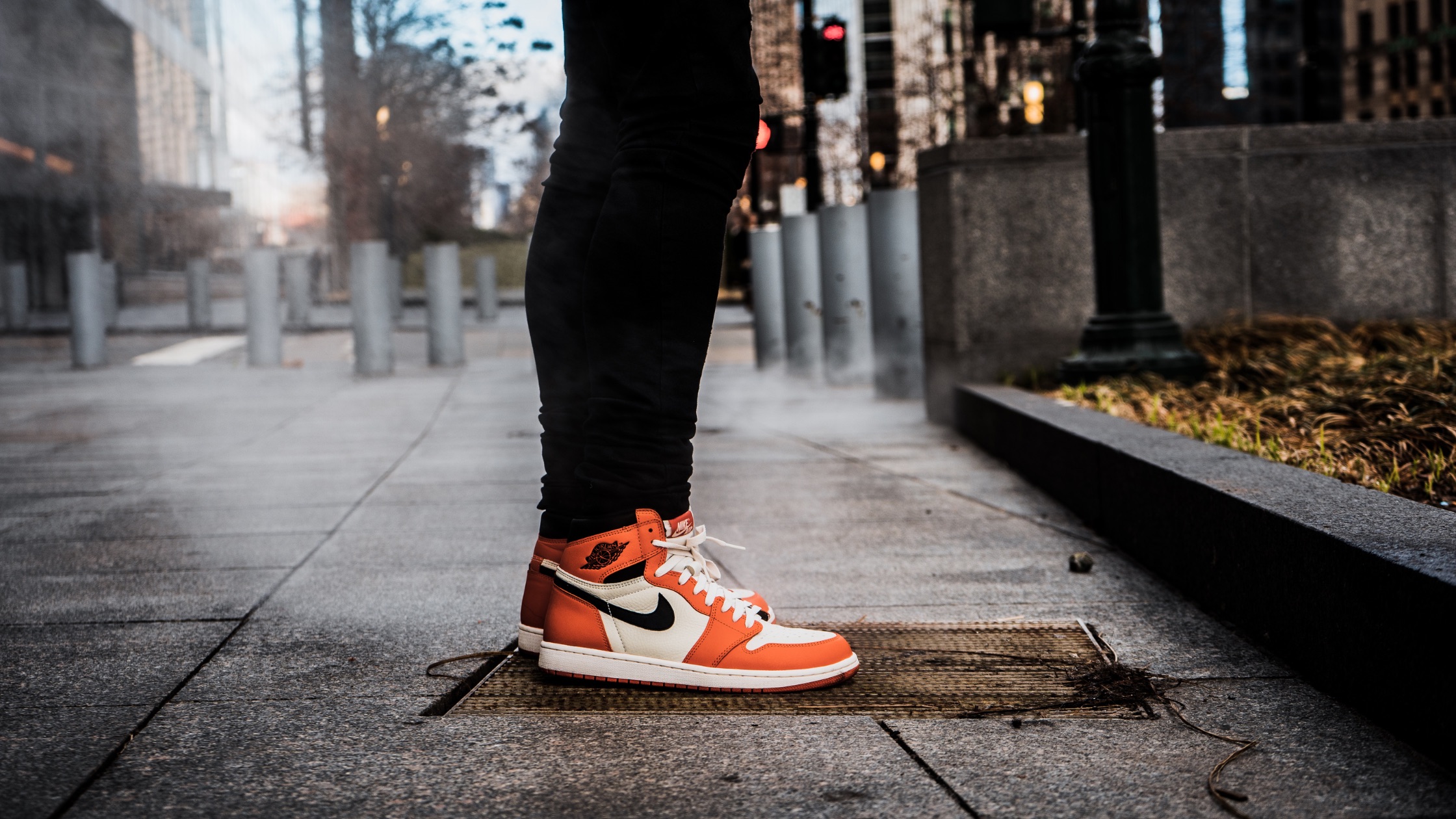 A pair of Nike sneakers on a city street