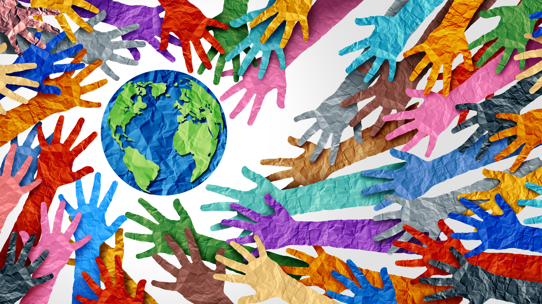 paper hands of many colors reaching toward a paper earth